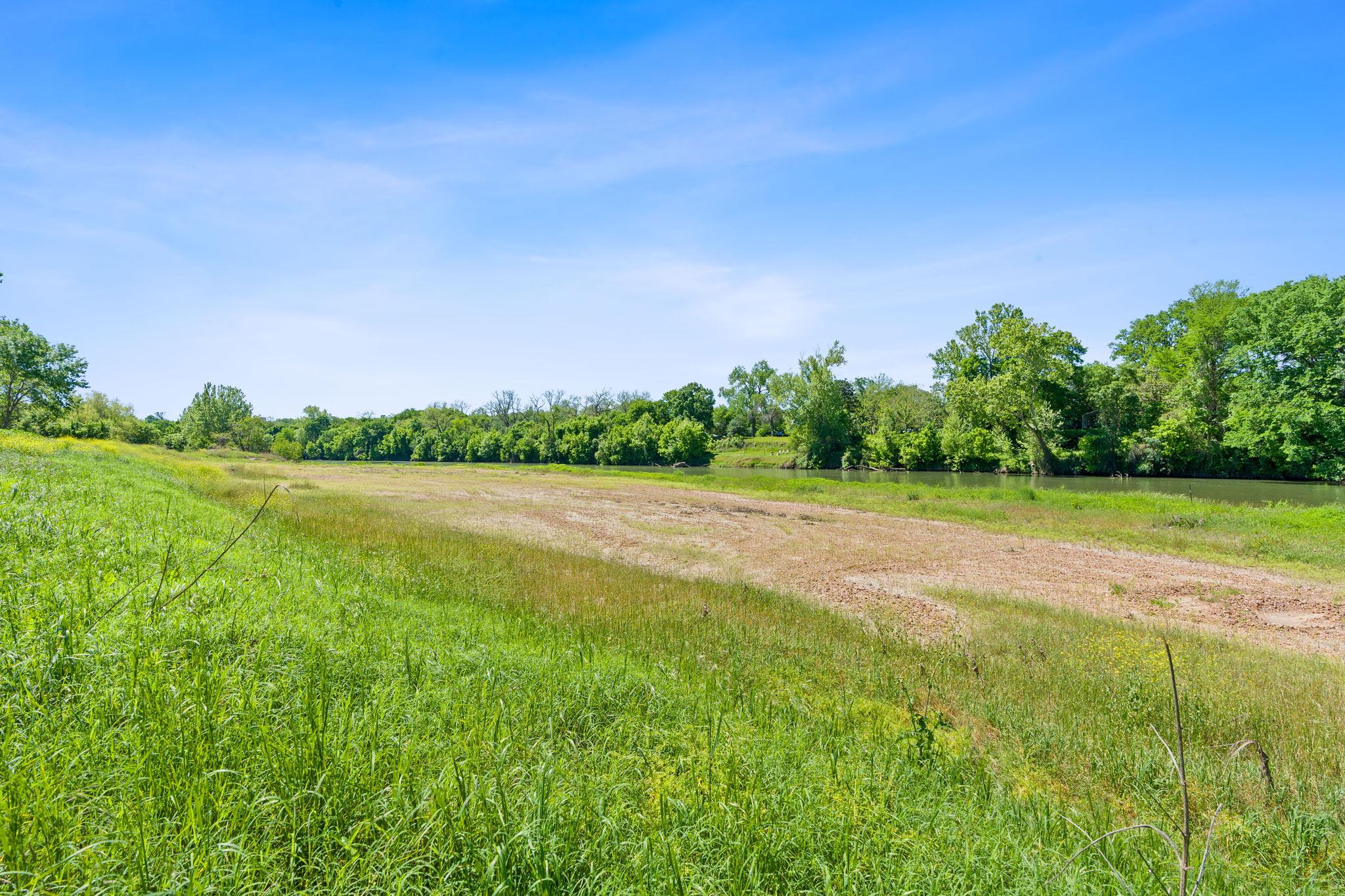 River frontage with green banks